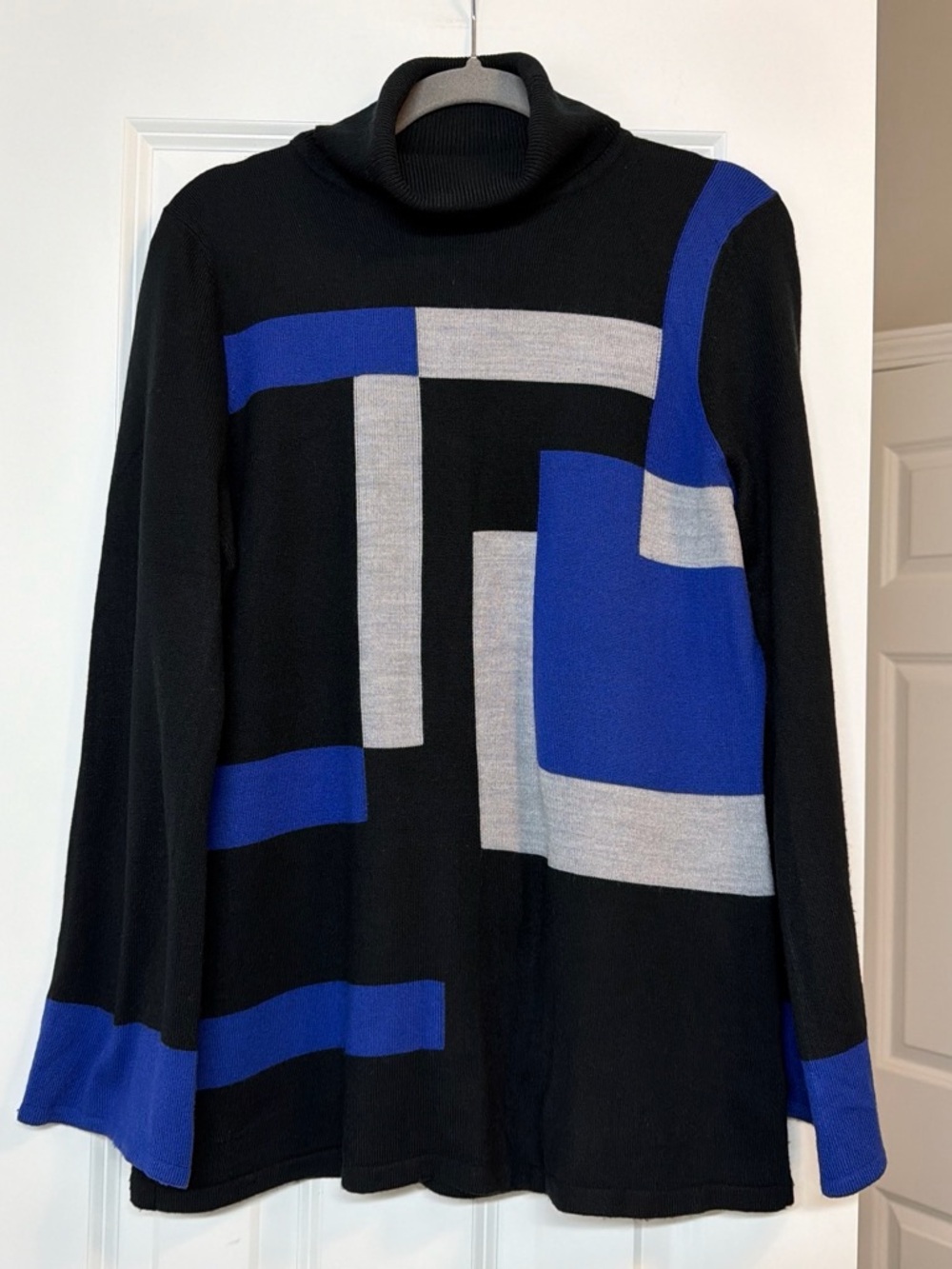 Luxe Black Turtleneck Sweater with Blue and Gray Geometric Panels